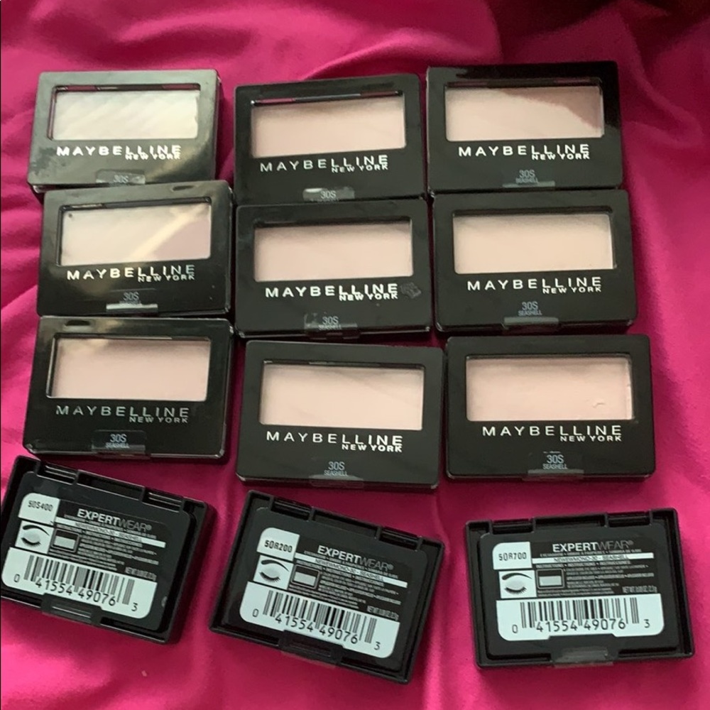 Lots Maybelline and lip gloss revlon